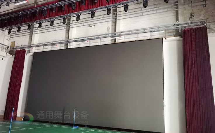 廣州黃花崗禮堂選擇通用舞臺！禮堂舞臺阻燃幕布、吊桿、舞臺燈光項目圓滿竣工！